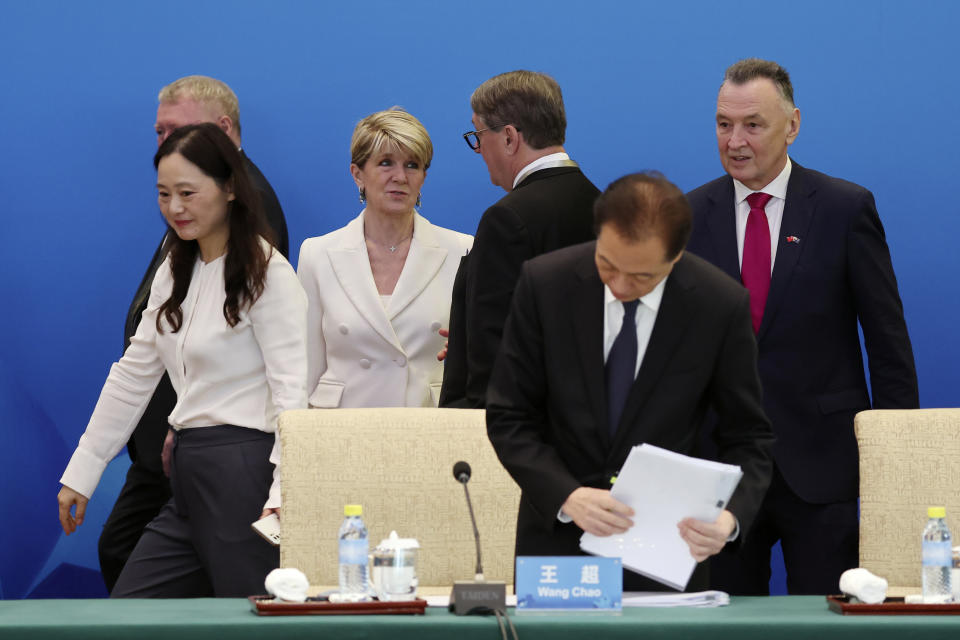 Australia's former Trade Minister Craig Emerson, right, and former Foreign Minister Julie Bishop, third left, arrive for the 7th China-Australia High Level Dialogue at the Diaoyutai State Guesthouse in Beijing Thursday, Sept. 7, 2023. (Florence Lo/Pool Photo via AP)