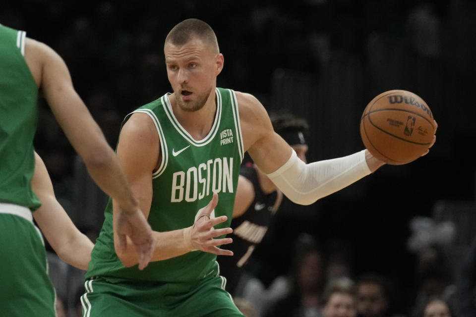 Boston Celtics center Kristaps Porzingis (8) during Game 2 of an NBA basketball first-round playoff series, Wednesday, April 24, 2024, in Boston. (AP Photo/Charles Krupa)