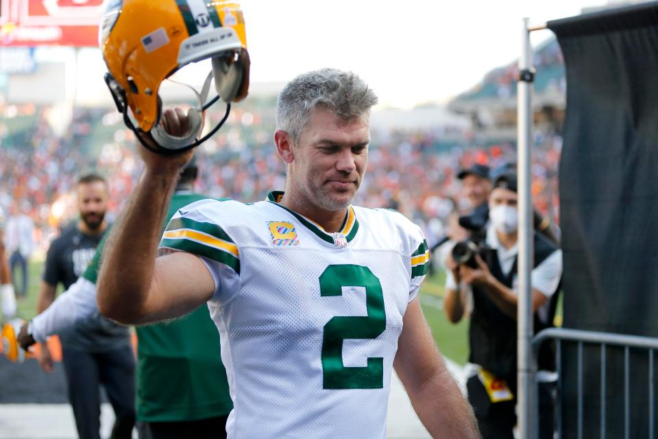 Green Bay Packers kicker Mason Crosby salutes fans after kicking the winning field goal in overtime against the Cincinnati Bengals on Oct. 10, 2021.