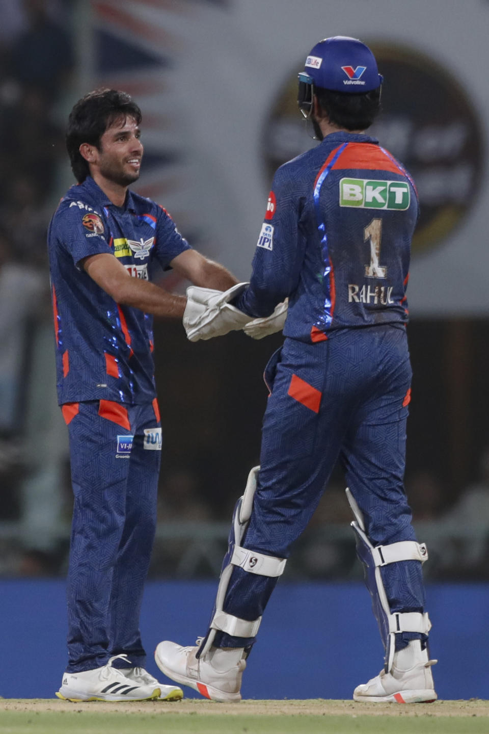Lucknow Super Giants' Ravi Bishnoi, left, celebrates the wicket of Kolkata Knight Riders' Sunil Narine with his teammate during the Indian Premier League cricket match between Lucknow Super Giants and Kolkata Knight Riders in Lucknow, India, Tuesday, May 5, 2024. (AP Photo/Pankaj Nangia)