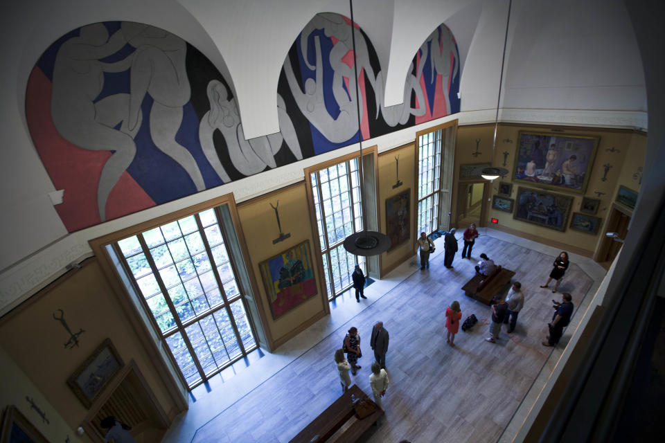 Visitors take in the main gallery during a preview of The Barnes Foundation Wednesday, May 16, 2012, in Philadelphia. After years of bitter court fights, the Barnes Foundation is scheduled to open its doors to the public on May 19 at its new location on Philadelphia's "museum mile." (AP Photo/Matt Rourke)