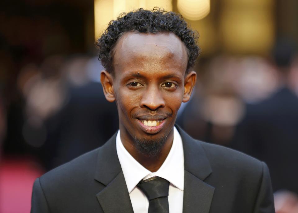 Abdi, best supporting actor nominee for his role in "Captain Phillips", arrives at the 86th Academy Awards in Hollywood