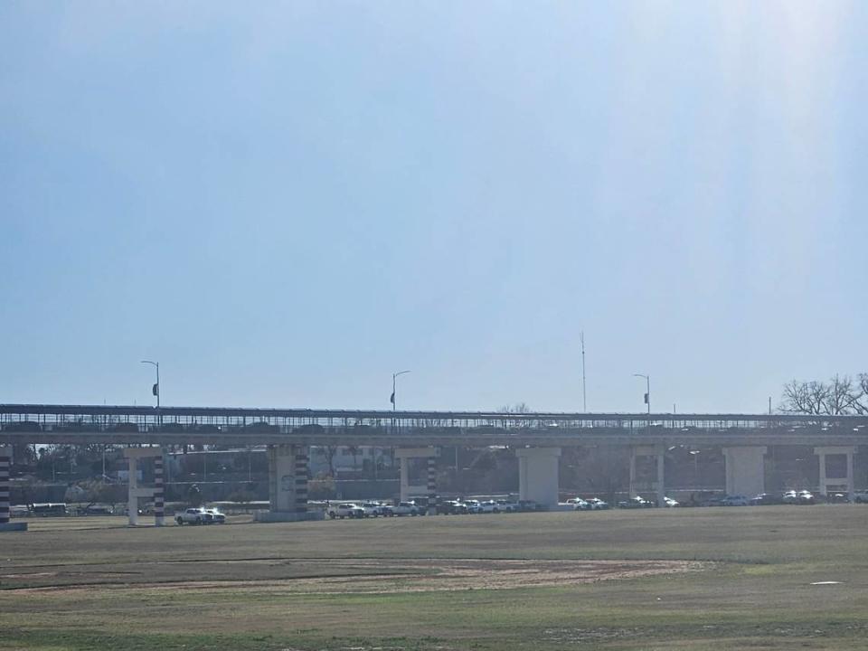 Migrants cross a legal port of entry in Eagle Pass, Texas.