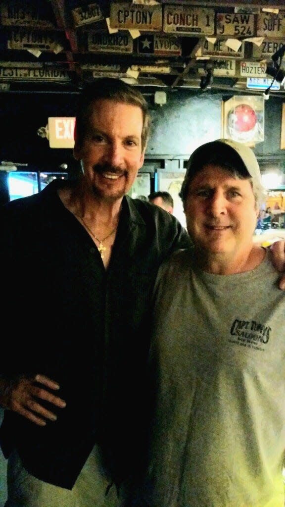 Joey Faber, the owner of Capt. Tony's Saloon, poses with Mike Leach on one of his many visits to Key West.