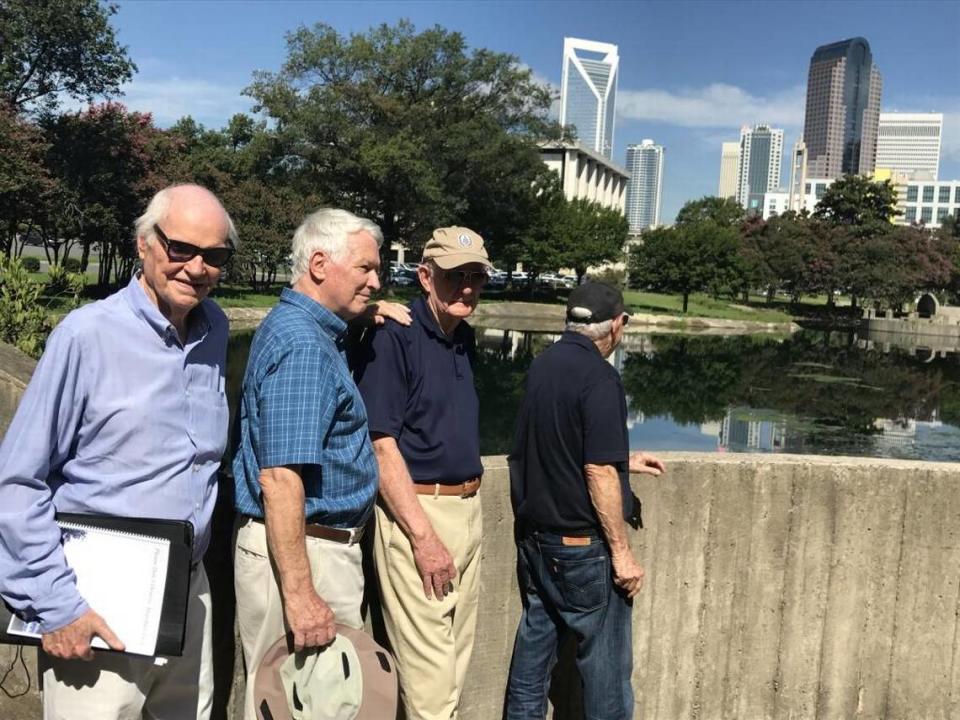 In 2017, Rolfe Neill worked to preserve green space in the Marshall Park area with development looming. Here, Neill is shown in August 2017 with, from left, architect Murray Whisnant, retired Duke Power CEO Bill Grigg and retired Bank of America CEO Hugh McColl. Taylor Batten/tbatten@charlotteobserver.com