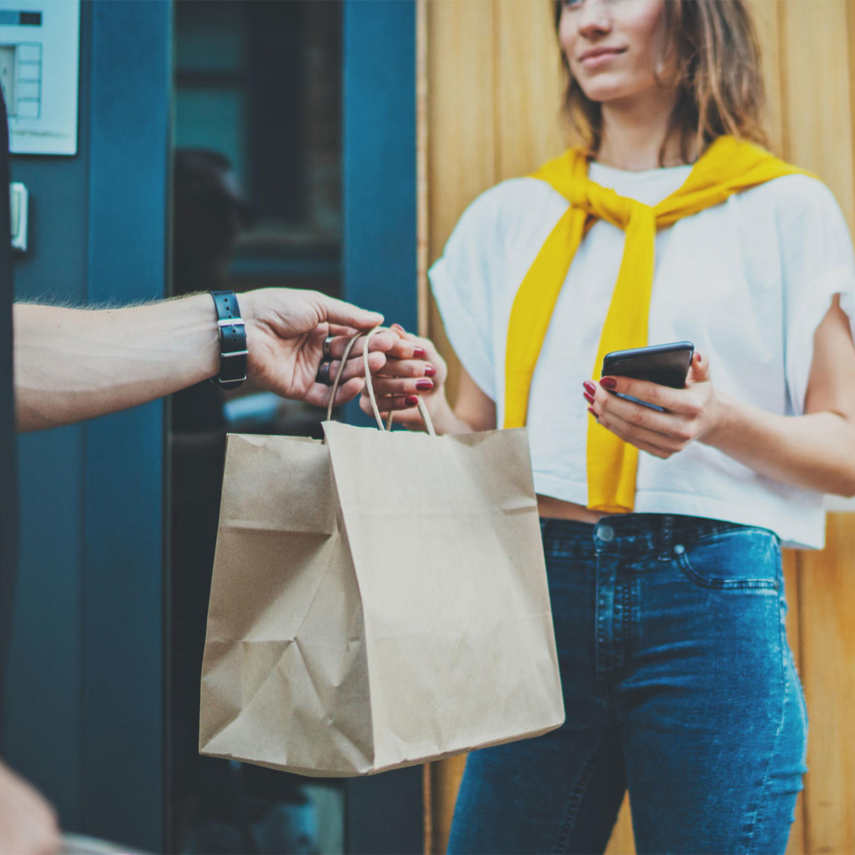 woman receiving takeout order