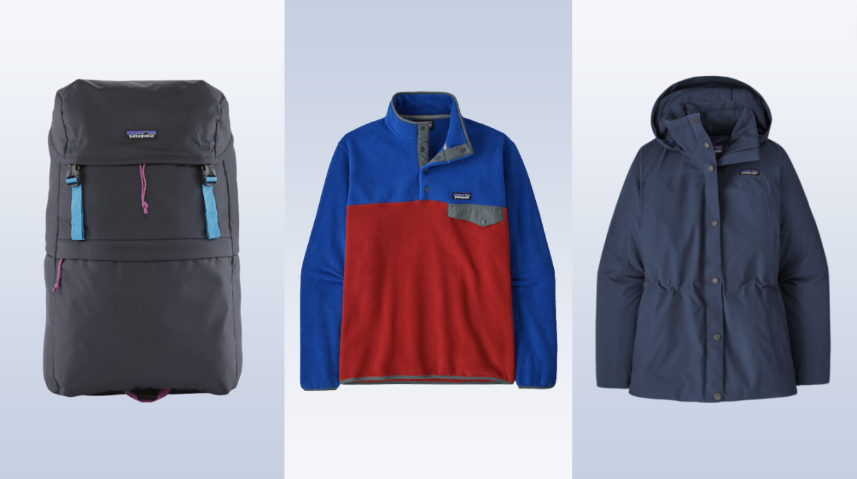 Patagonia sale clothes and backpack on blue background.