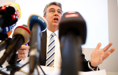 Andreas Mundt, president of Germany's Federal Cartel Office addresses a news conference presenting findings of the anti-trust watchdog's investigation into Facebook's data collection practices in Bonn, Germany, February 7, 2019. REUTERS/Wolfgang Rattay