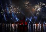 Sweden's brig Tre Kronor with scarlet sails floats on the Neva River during the Scarlet Sails festivities marking school graduation, in St. Petersburg, Russia, June 24, 2018. REUTERS/Henry Romero