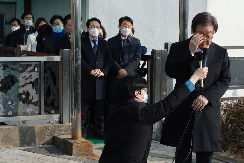 South Korean opposition leader Lee Jae-myung leaves after being discharged from the hospital in Seoul