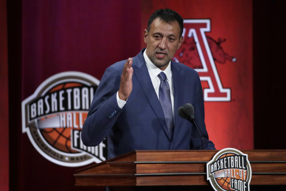 CORRECTS TO FRIDAY, SEPT, 6 - Inductee Vlade Divac speaks during the Basketball Hall of Fame enshrinement ceremony Friday, Sept. 6, 2019, in Springfield, Mass. (AP Photo/Elise Amendola)