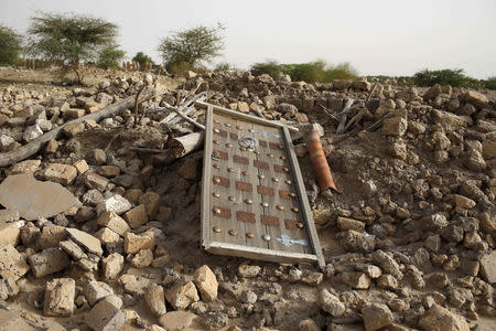 The rubble left from an ancient mausoleum destroyed by Islamist militants, is seen in Timbuktu, Mali, July 25, 2013. REUTERS/Joe Penney/File Photo