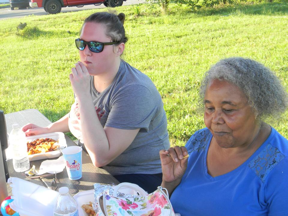 Brittany White and Gail Hamilton enjoy the inaugural Oak Ridge Food Truck Rally.