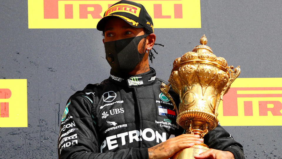 Lewis Hamilton, pictured here celebrating on the podium after winning the British Grand Prix.