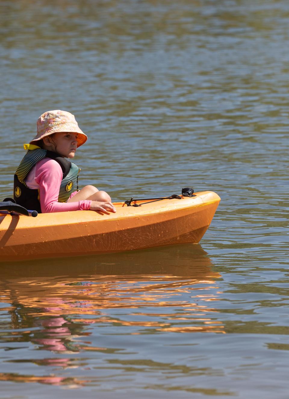 Macey Thomas, from West Jordan, sits in the front of a kayak on East Canyon Reservoir at East Canyon State Park in Morgan on Monday, July 17, 2023. | Megan Nielsen, Deseret News