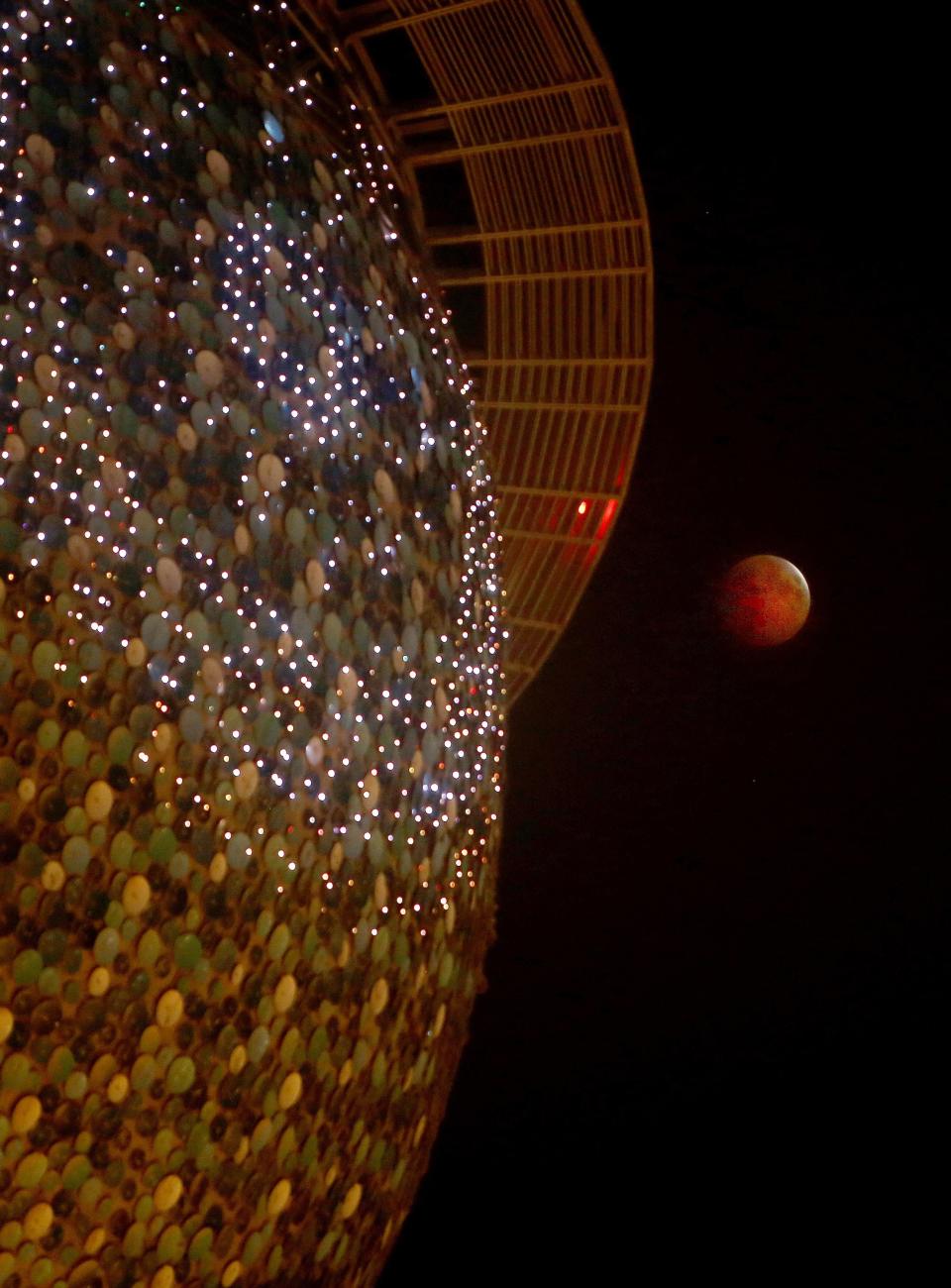 As it passes by Kuwait Towers in Kuwait City. (Photo: YASSER AL-ZAYYAT via Getty Images)