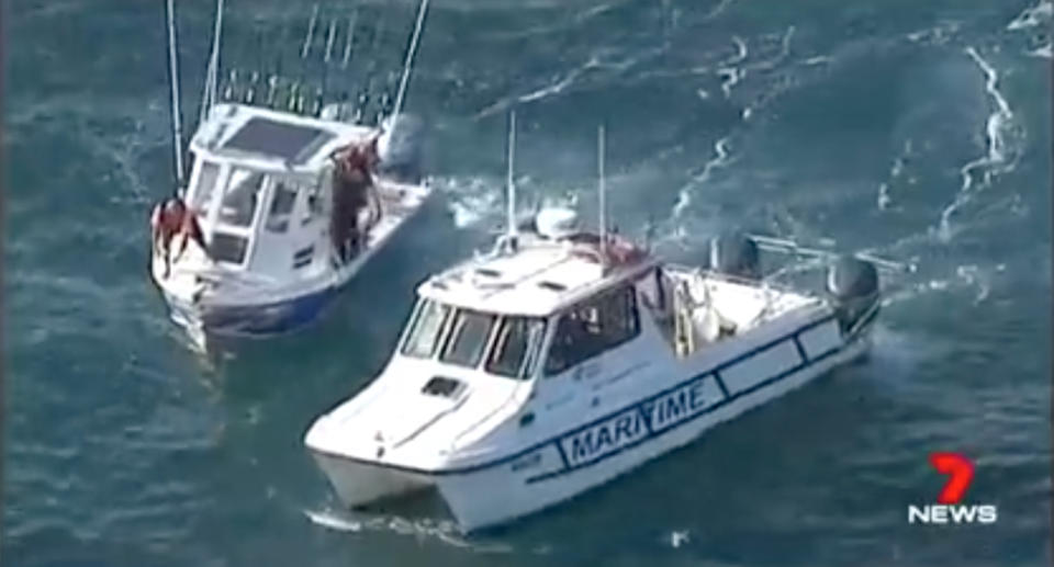 The father and son worked frantically to save their vessel, and themselves, before help arrived. Source: 7 News
