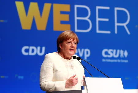 German Chancellor Angela Merkel speaks during Manfred Weber's, candidate of the European People's Party (EPP) for the next European Commission President, final campaign event ahead of the EU election in Munich, Germany, May 24, 2019. REUTERS/Michael Dalder