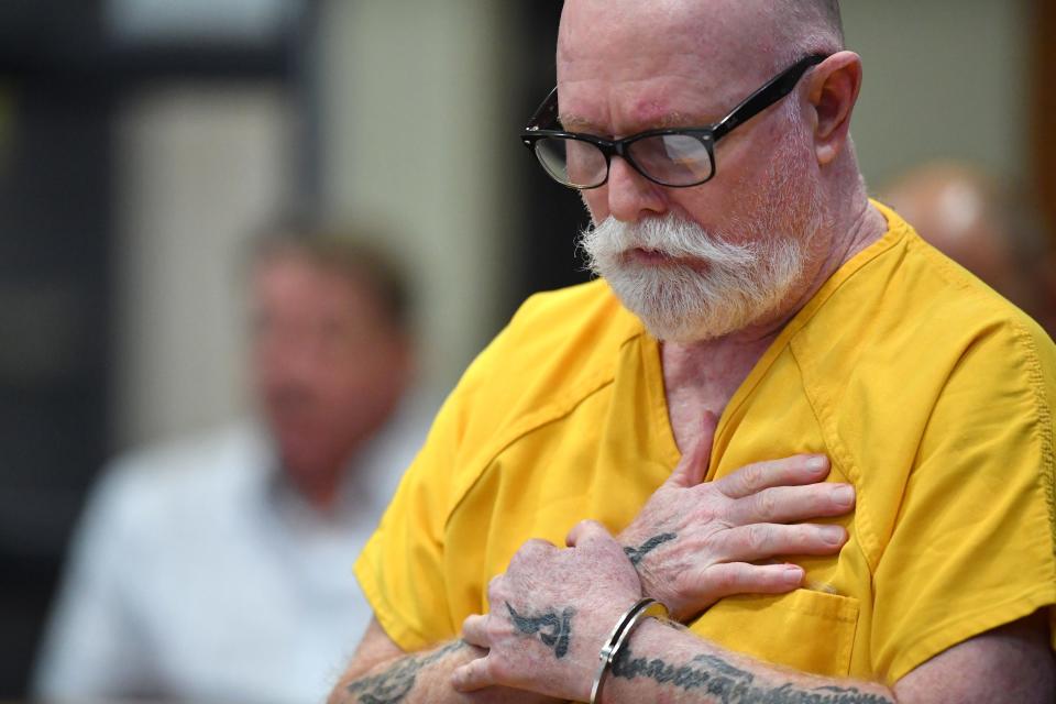 John Pyle makes a statement in court Friday during his sentencing hearing for 30 counts of possession of child pornography and one count of failure to appear.