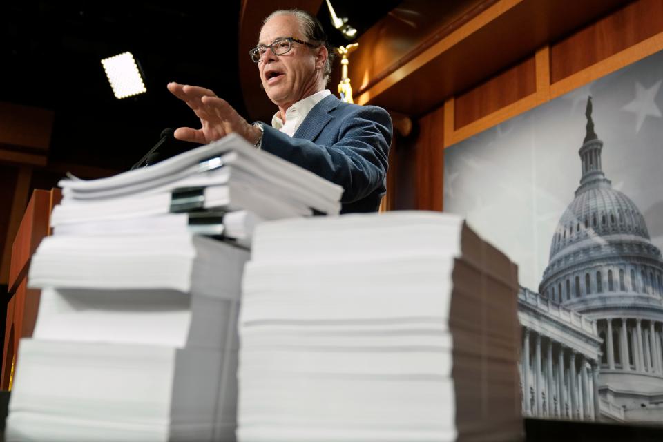 Sen. Mike Braun, R-Ind., speaks during a news conference on the budget bill, Tuesday, Dec. 20, 2022, on Capitol Hill in Washington.