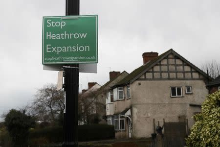 An anti-Heathrow airport expansion poster is seen in the village of Harmondsworth, very close to the proposed site of the airport's third runway, near London, Britain February 2, 2017. REUTERS/Stefan Wermuth