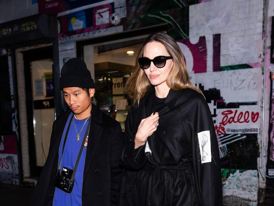 Pax Jolie-Pitt and Angelina Jolie in New York City on December 28, 2023.