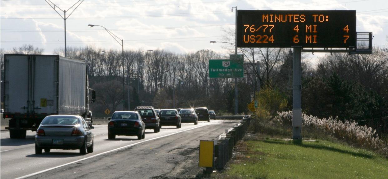 An Ohio Department of Transportation traffic sign gives travel times for drivers on southbound Route 8 near the Tallmadge Avenue exit in Akron.