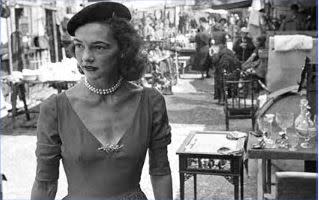 Nancy Talbot shopping at a flea market in Paris in the 1940s.