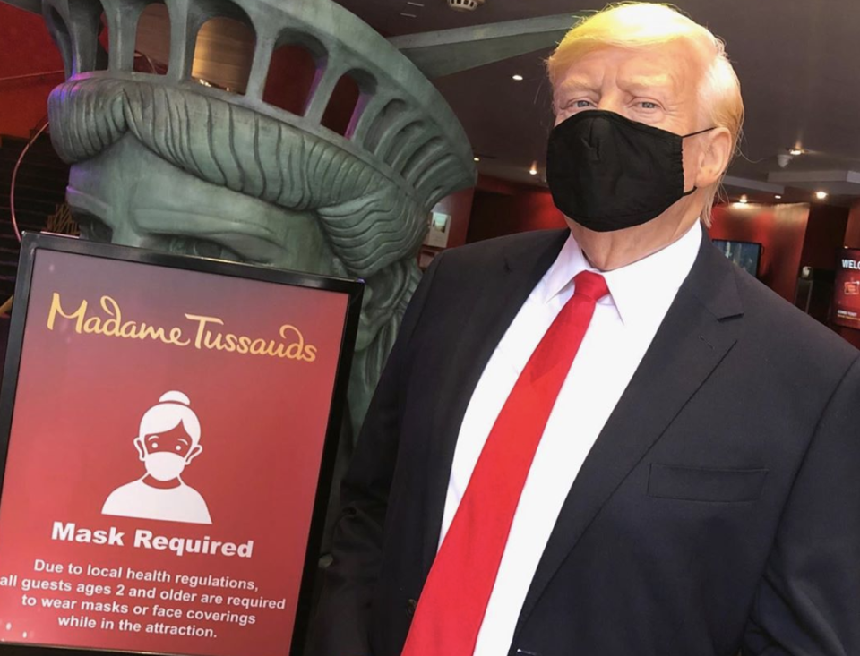 A wax figure of President Donald Trump at Madame Tussauds in New York wears a face mask. (Photo: Instagram)