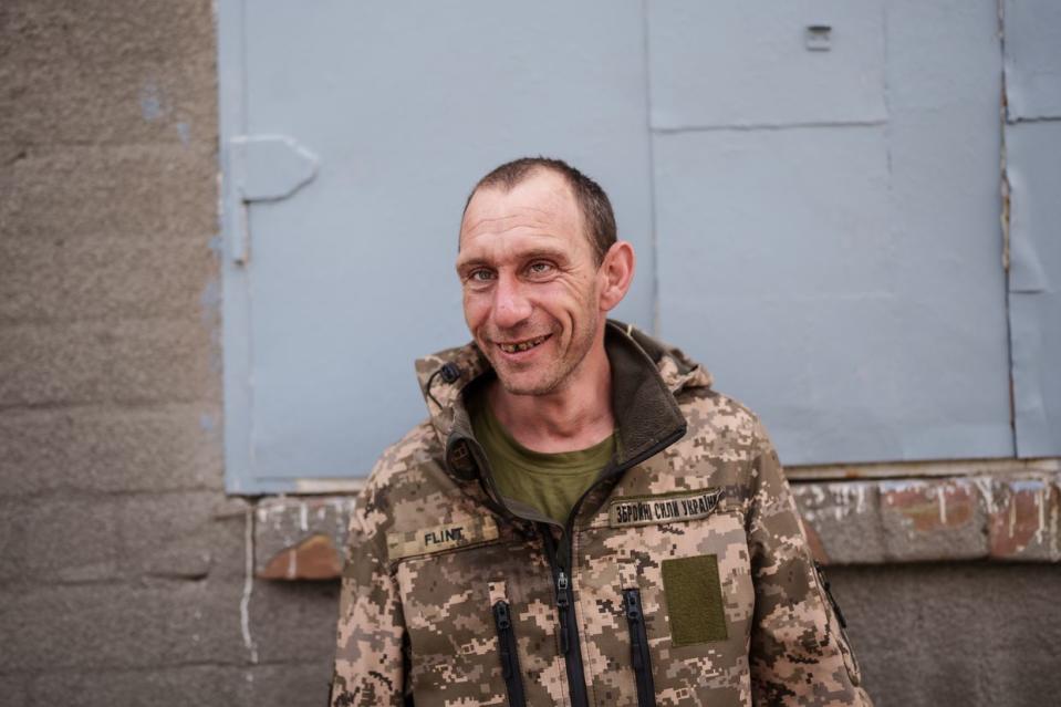 Ukrainian serviceman Bohdan gets out of the Hospitallers evacuation bus near a hospital in Dnipro city on April 25, 2024. (Serhii Korovayny/The Kyiv Independent)