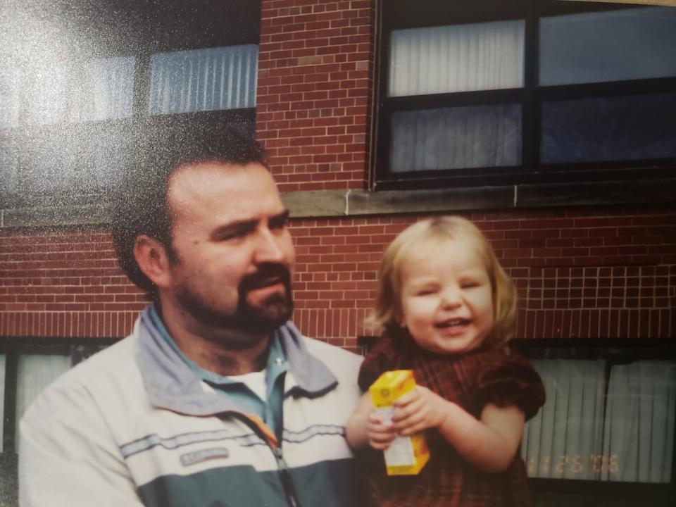 Chris Daken with daughter Lexi, when she was about 2 years old. 