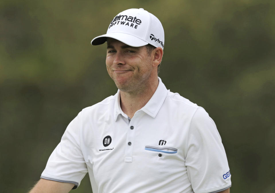 Luke List reacts after sinking a putt for birdie on the ninth green during the final round of the PGA Championship golf tournament, Sunday, May 19, 2019, at Bethpage Black in Farmingdale, N.Y. (AP Photo/Charles Krupa)