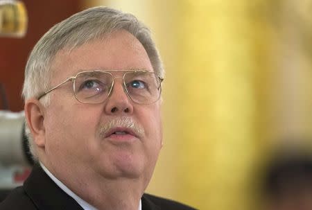 New U.S. ambassador to Russia John Tefft attends a ceremony to hand over credentials to Russian President Vladimir Putin at the Kremlin in Moscow, November 19, 2014. REUTERS/Alexander Zemlianichenko/Pool