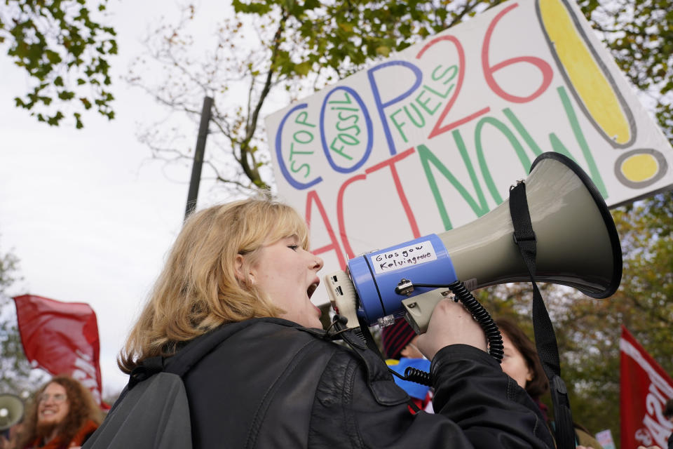 Climate activists march through the streets of Glasgow, Scotland, Friday, Nov. 5, 2021 which is the host city of the COP26 U.N. Climate Summit. The protest was taking place as leaders and activists from around the world were gathering in Scotland's biggest city for the U.N. climate summit, to lay out their vision for addressing the common challenge of global warming. (AP Photo/Alberto Pezzali)