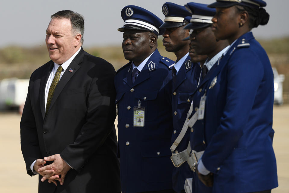 US Secretary of State Mike Pompeo departs from the International airport in Dakar, Senegal, Sunday, Feb. 16, 2020, as part of Pompeo's first visit to sub-Saharan Africa during which he will seek to lay out a positive vision for US cooperation with the continent where China has been increasingly active. (Andrew Carballero-Reynolds/Pool Photo via AP)