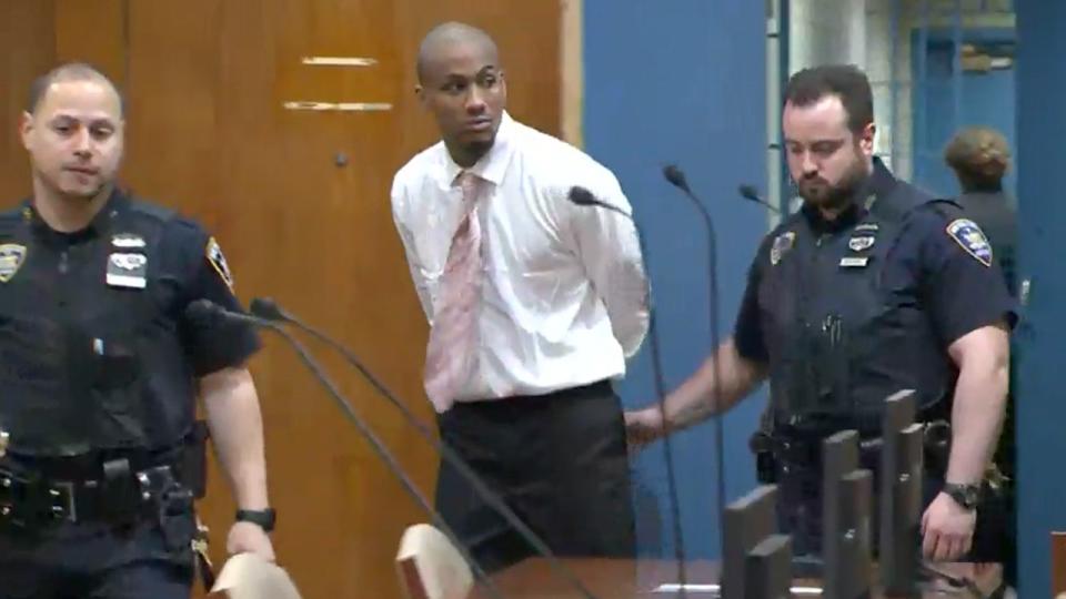 Guy Rivera enters court