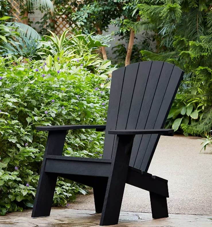 Captiva Casual Adirondack Chair Onyx. (Image via The Home Depot)