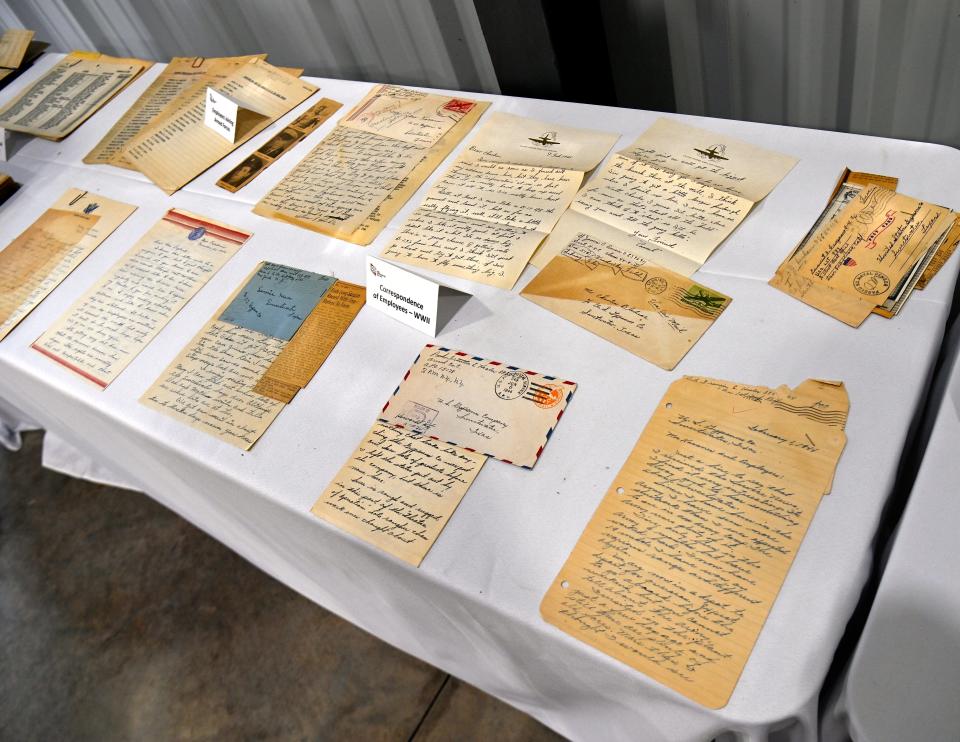 A table at United States Gypsum in Sweetwater displays correspondence on Tuesday from former workers writing back to the company while they were away fighting in World War II.