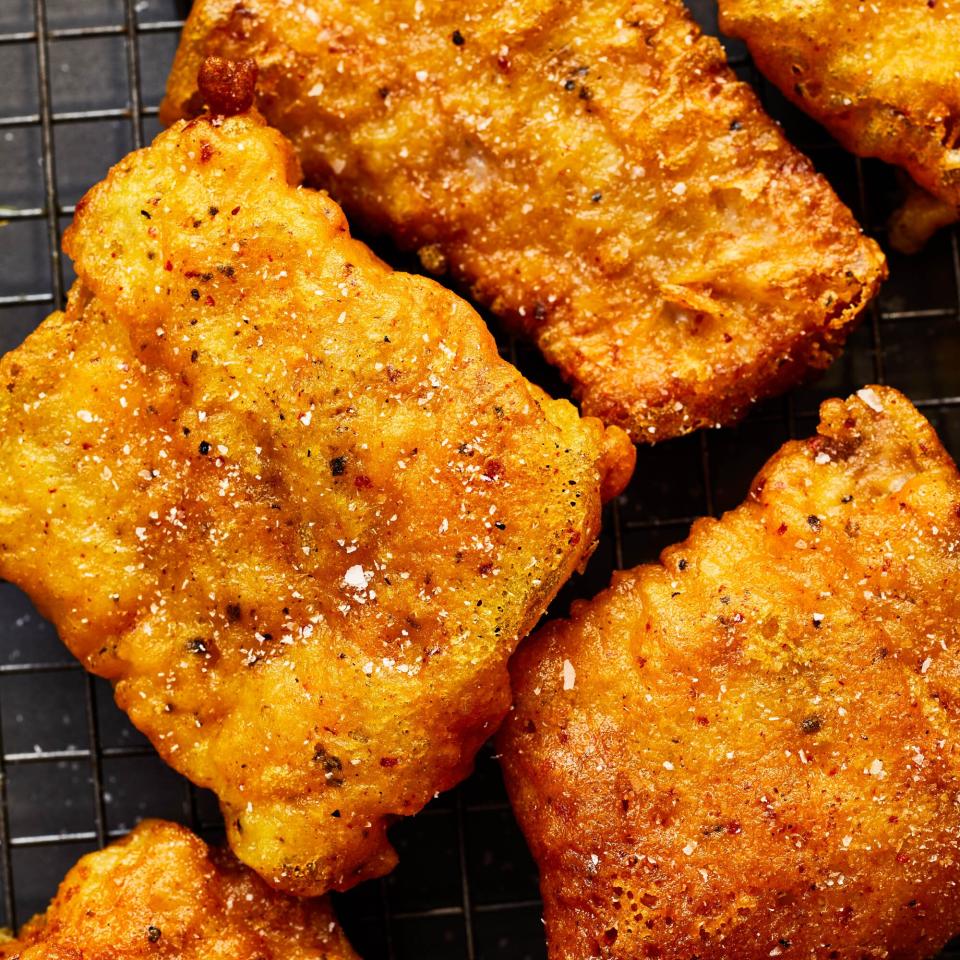 seasoned crispy fish on a rack