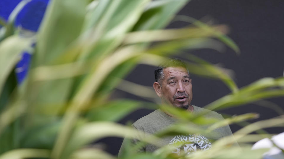 Shane Treu speaks during an interview Tuesday, Aug. 15, 2023, in Wailuku, Hawaii. A video by Treu and others captured the early moments of what would become the deadliest U.S. wildfire in more than a century. (AP Photo/Rick Bowmer)