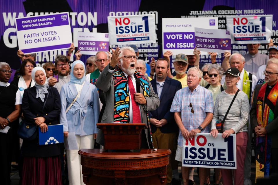 Aug 2, 2023; Columbus, Ohio, USA;  Rev. Dr. Tim Ahrens of the First Congregational Church speaks during a gathering of Columbus faith leaders speaking out against Issue 1 in a “Faith Votes No” rally at Washington Gladden Social Justice Park downtown.