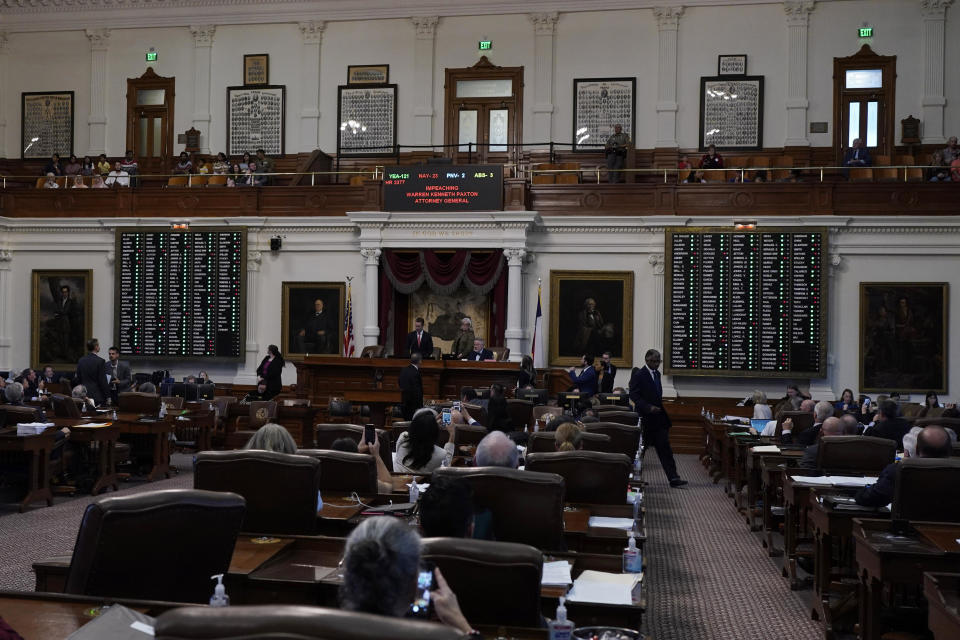 Voting boards are lit with a majority of green lights as the house votes to impeach state Attorney General Ken Paxton, in the House Chamber at the Texas Capitol in Austin, Texas, Saturday, May 27, 2023. Texas lawmakers have issued 20 articles of impeachment against Paxton, ranging from bribery to abuse of public trust as state Republicans surged toward a swift and sudden vote that could remove him from office. / Credit: Eric Gay / AP