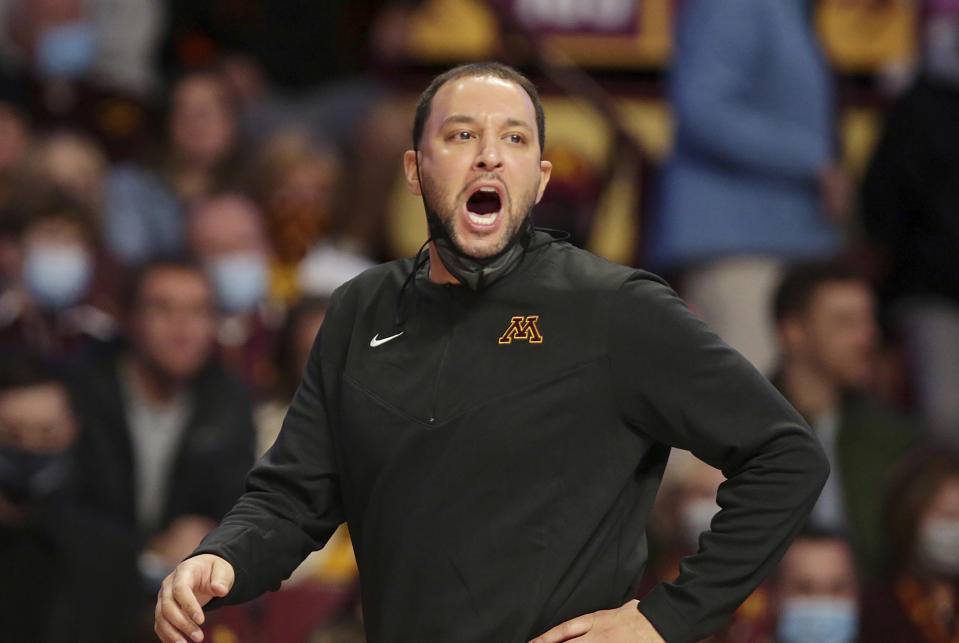 Minnesota's first-year head coach Ben Johnson yells in the first half of an NCAA college basketball game against Kansas City, Tuesday, Nov. 9, 2021, in Minneapolis. (AP Photo/Andy Clayton-King)