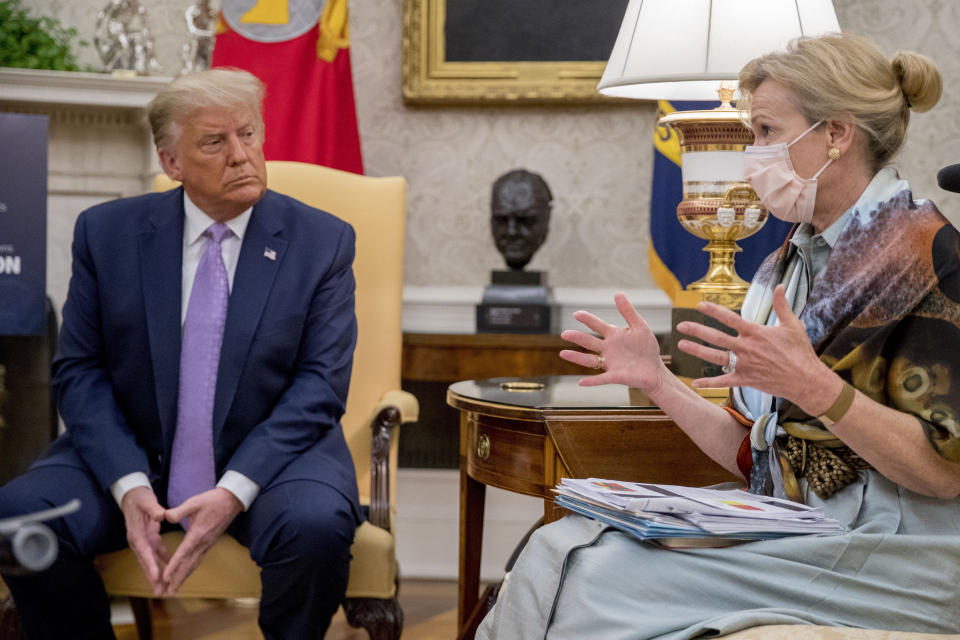 FILE - In this Aug. 5, 2020, file photo, Dr. Deborah Birx, White House coronavirus response coordinator, speaks as President Donald Trump meets with Arizona Gov. Doug Ducey in the Oval Office of the White House in Washington. Birx was brought into President Donald Trump’s orbit to help fight the coronavirus, she had a sterling reputation as a globally recognized AIDS researcher and a rare Obama administration holdover. Less than 10 months later, her reputation is frayed and her future in President-elect Joe Biden's administration uncertain. (AP Photo/Andrew Harnik, Pool, File)