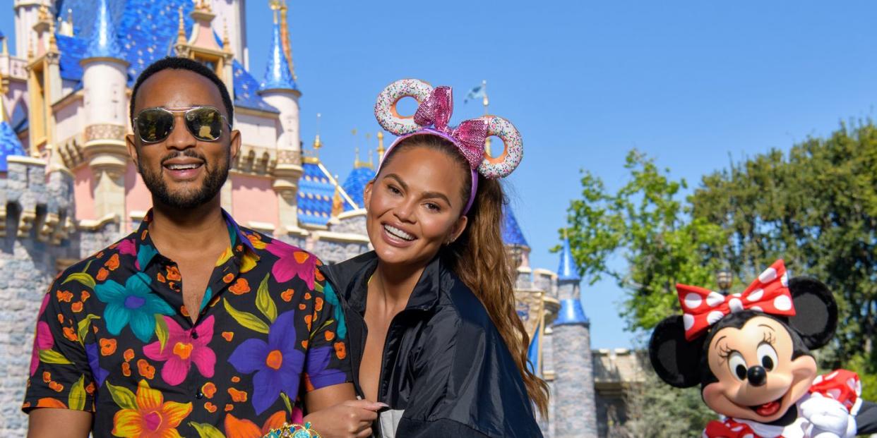 chrissy teigen and john legend visit disneyland resort in anaheim, california