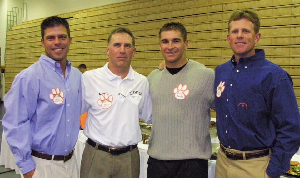 Kevin O'Sullivan, left, Jack Leggett, Erik Bakich, middle right, a volunteer assistant, and Tim Corbin, during a 2002 baseball banquet.