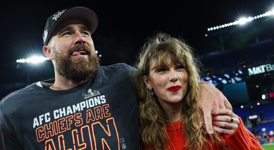 Travis Kelce of the Kansas City Chiefs celebrates with Taylor Swift after defeating the Baltimore Ravens in the AFC Championship Game at M&T Bank Stadium on Jan. 28, 2024 in Baltimore.