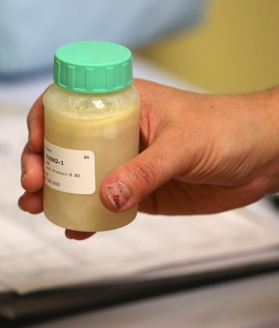Bottles of breastmilk issued to families with urgent needs are stored Tuesday, Feb. 14, 2023, at the The Milk Bank's Memorial Hospital donor milk depot and donor milk express site in South Bend.