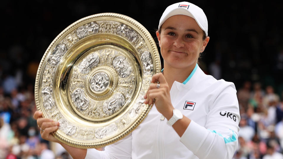 Ash Barty of liftsthe Venus Rosewater Dish trophy after winning the Wimbledon final against Karolina Pliskova. (Photo by Clive Brunskill/Getty Images)