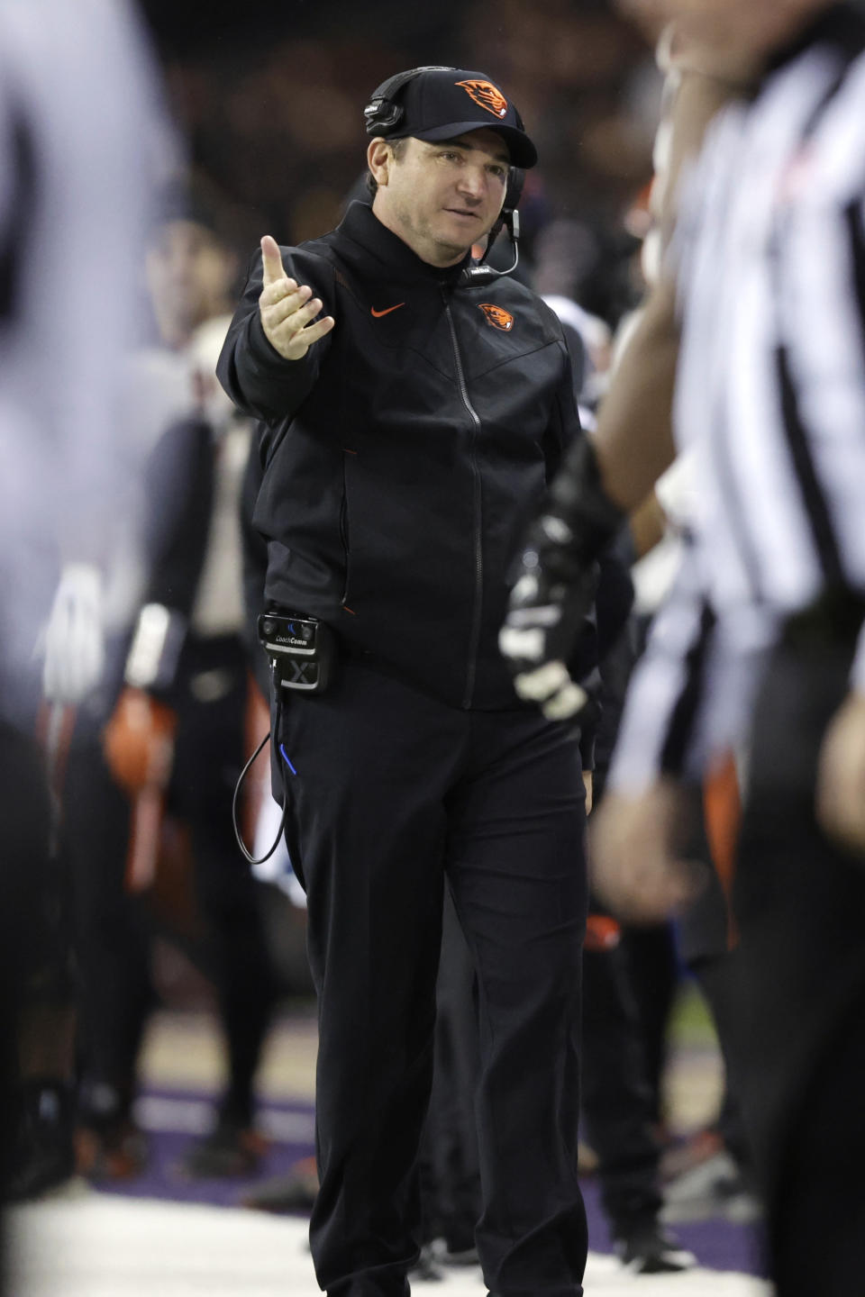 Oregon State Oregon State head coach Jonathan Smith gestures from the bench against Washington during the second half of an NCAA college football game, Friday, Nov. 4, 2022, in Seattle. Washington won 24-21. (AP Photo/John Froschauer)